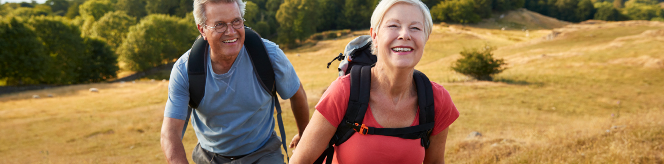 A mature couple on an outdoor hike